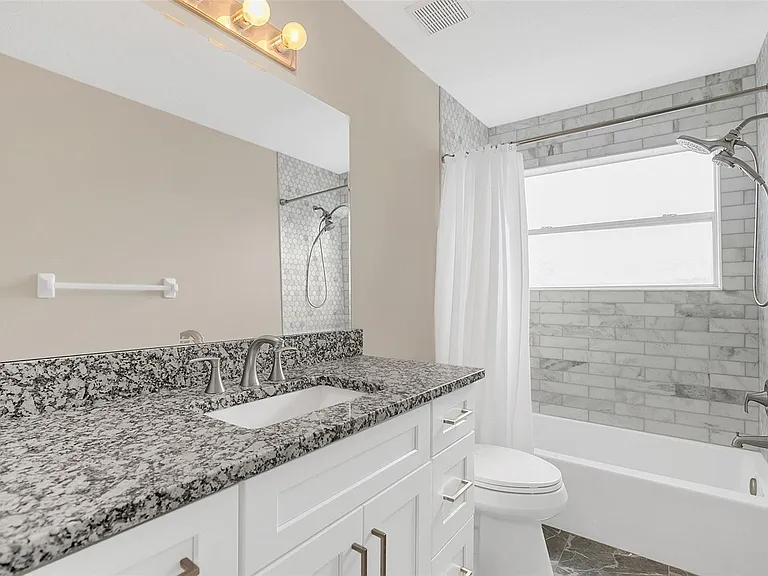 7221 Bay Club Way — Photo 12