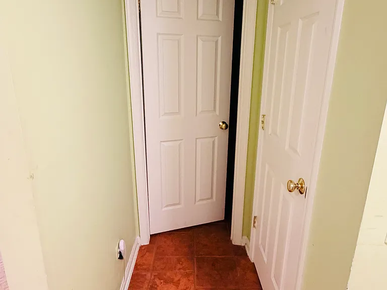 Garage Entrance to Half Bath