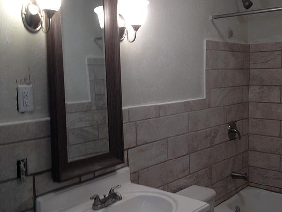 Jack an Jill bathroom with full bath and shower