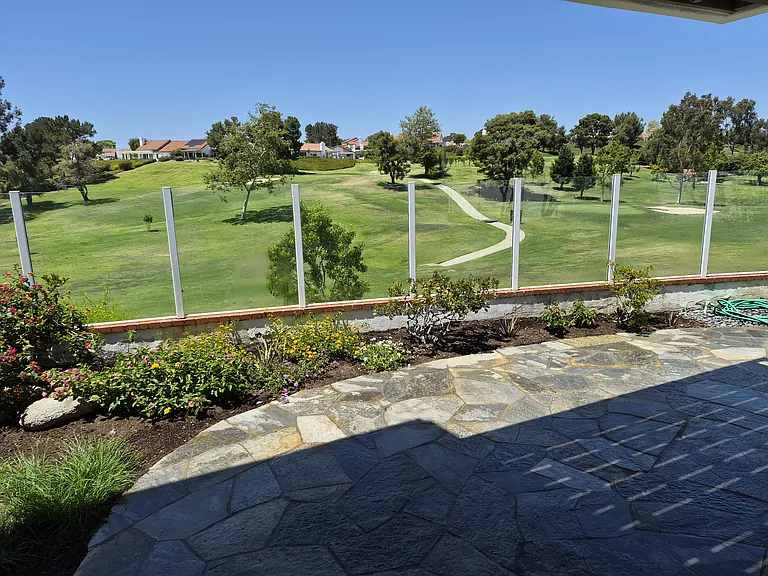 Patio view with shade from the balcony.