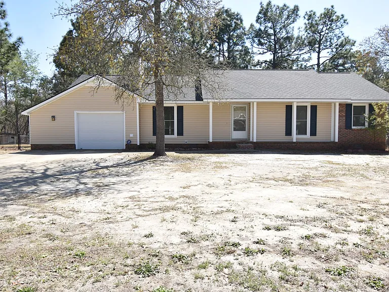6901 Woodmark Dr — Photo 1