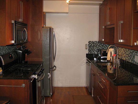 Kitchen with granite counters and stainless steel appliances
