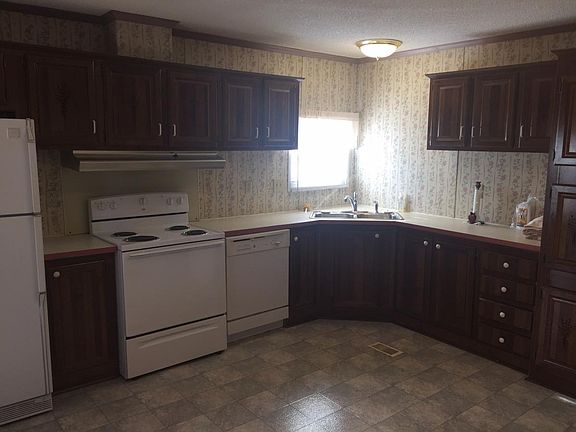 Ample kitchen with window over sink