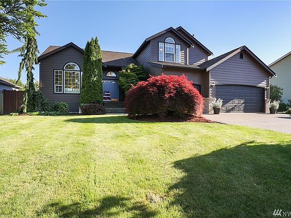This rare find is the only home in Copperwynd with a 3 car attached garage PLUS a detached 14 x 22 shop!