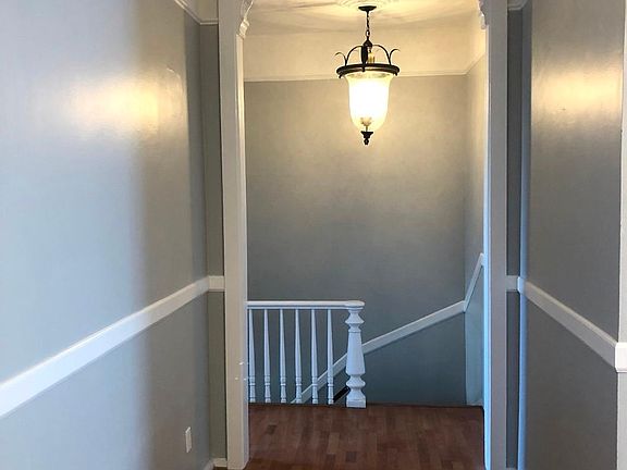Entrance at top of stairs.