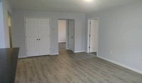 Living Room, 2nd bedroom in center