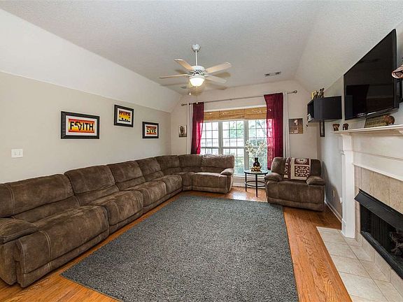 Large family room with hardwood floors