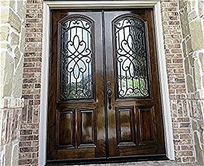  What a  Grand entrance into your new home as you walk threw the dramatic Double 8 foot front door with gorgeous wrought iron design.