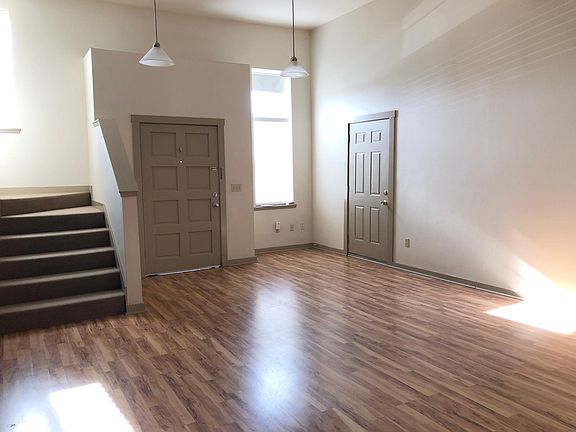 Entryway to unit, and door to attached garage.