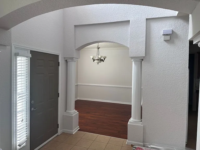 Dining room and principal door entry