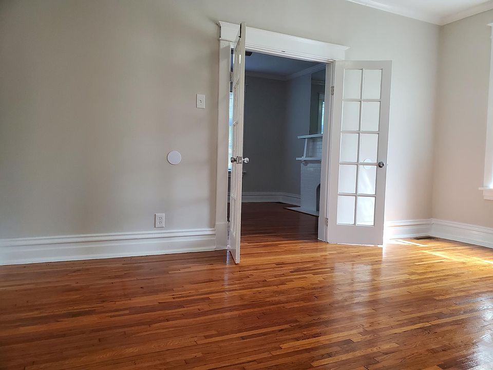 Middle Room looking towards connected front room with glass french doors.