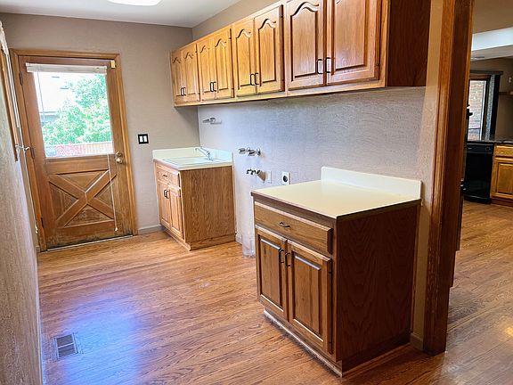 Laundry room right off garage and kitchen.