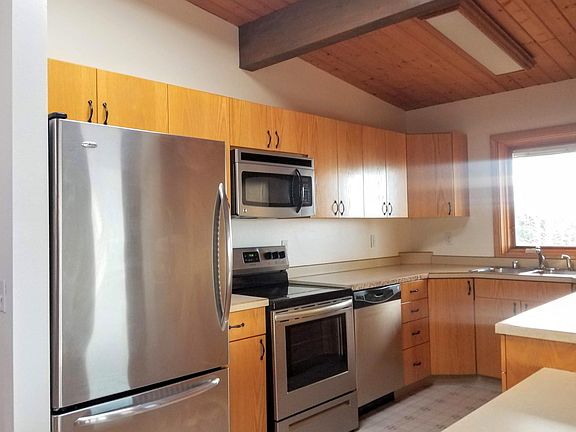 Eat-in Kitchen with Stainless Steel Appliances & Skylight