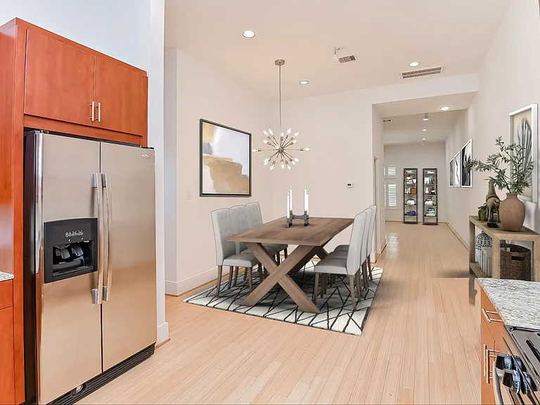 Stainless steel newer fridge, gas stove, microwave, and dishwasher. Plenty of counter and cabinet space.