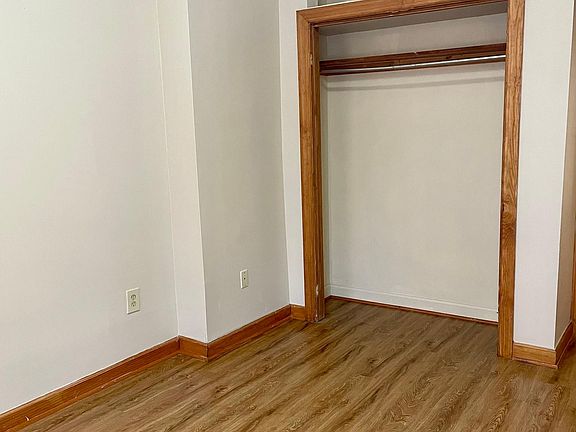 Spacious front bedroom large closet with overhead storage.