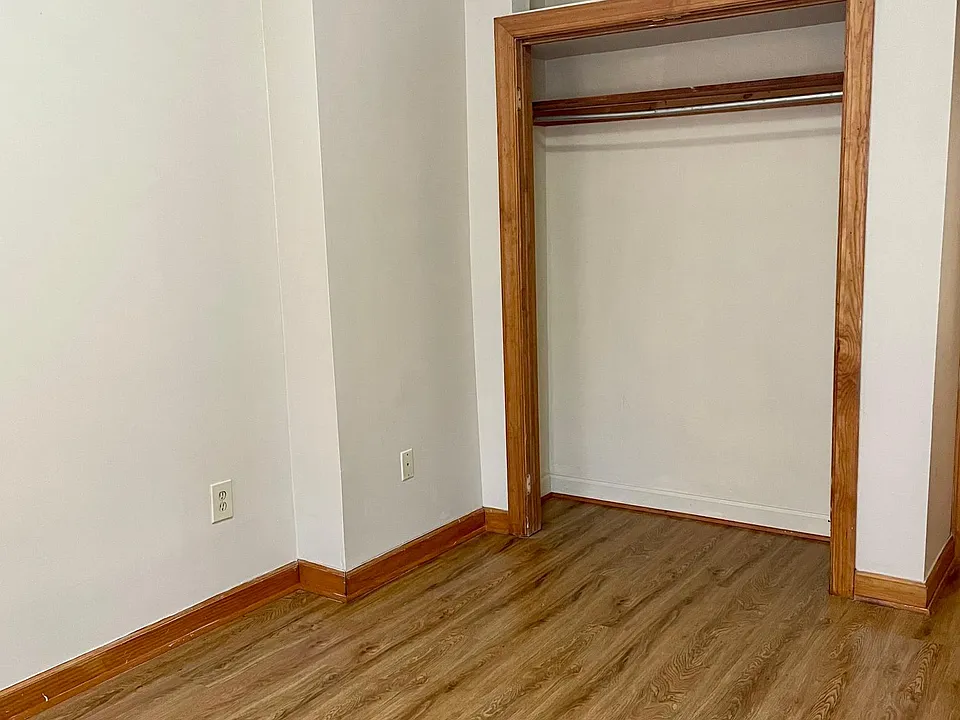 Spacious front bedroom large closet with overhead storage.
