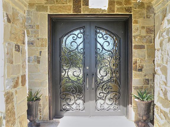 Double metal front doors with leaded glass