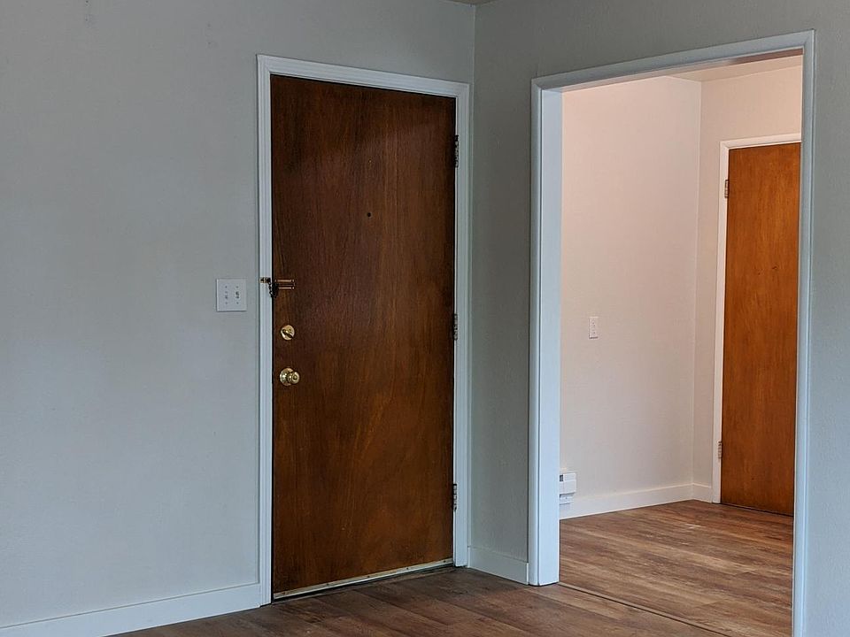 Front door, living room & dining room