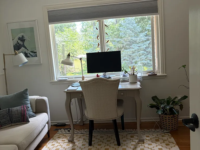 Second story bedroom #4 with overlooks the tree lined backyard