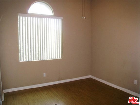 5th image of 6525 Woodman Ave APT 6