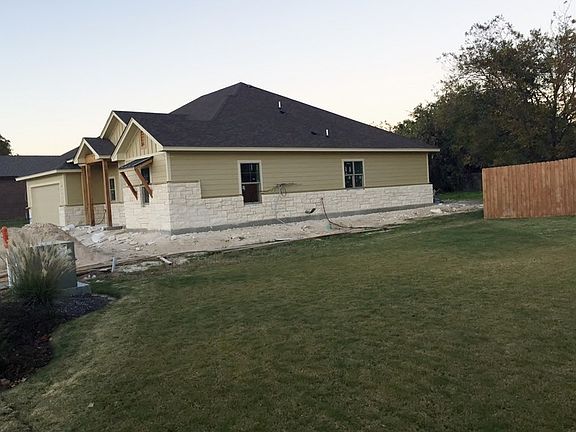 Exterior photo
						:
						Craftsman Ranch exterior with white/cream Austin stone