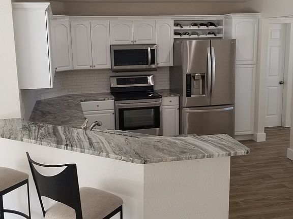 Large  Open kitchen all stainless appliances