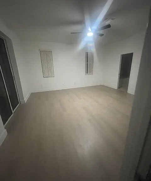 Master Bed room with sliding doors and his and hers closet