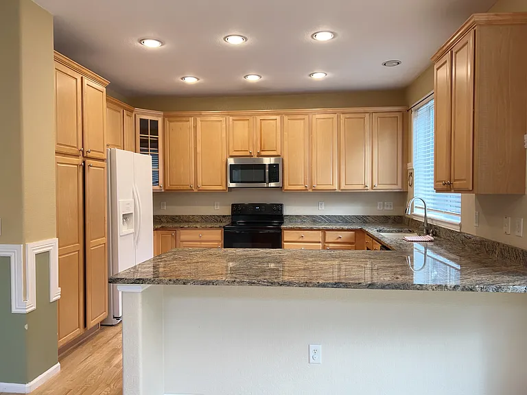 Kitchen with granite countertops