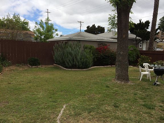 Large fenced side yard