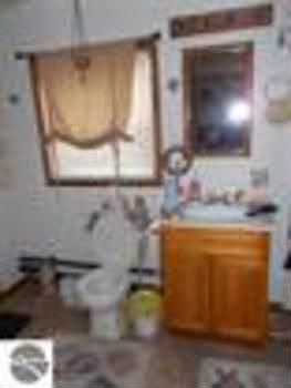 Bathroom is 4pc. bath with hookups for the washer and dryer.
