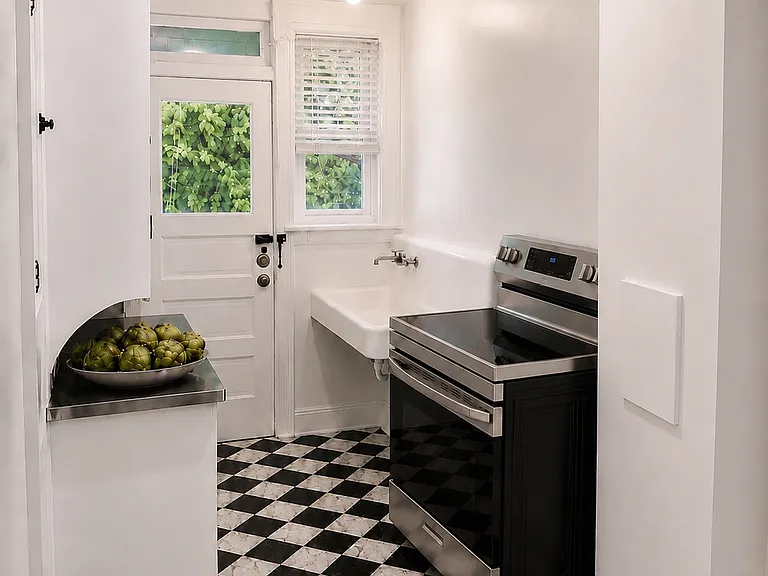 Kitchen with brand new stainless steel stove