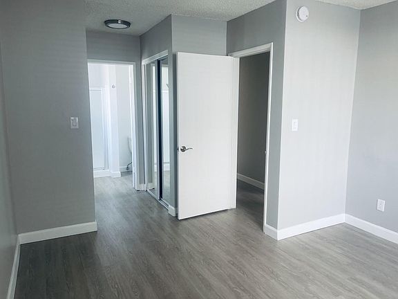 Bedroom with full bathroom