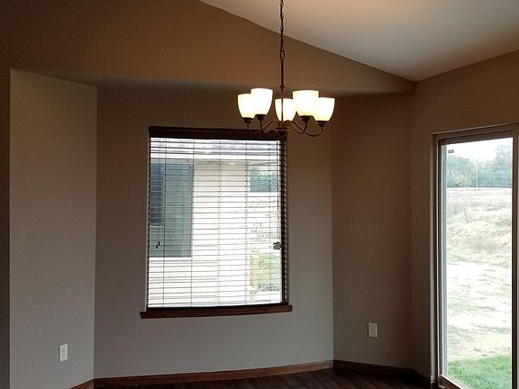 Dining Room with Hardwood Floors, Chandelier