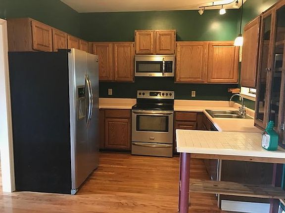 Kitchen is now painted a light tan.