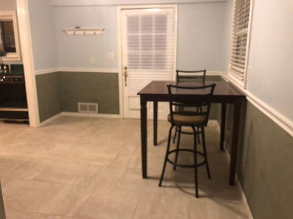 Large Eat-In Kitchen! Brand NEW Modern Paint and Flooring throughout!