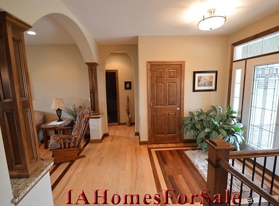 Wide Maple Trim and 6-panel Maple Doors throughout this home.