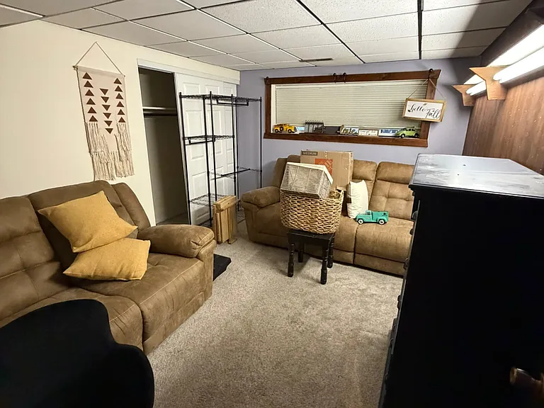 Bedroom #4 currently converted as additional lounge space.