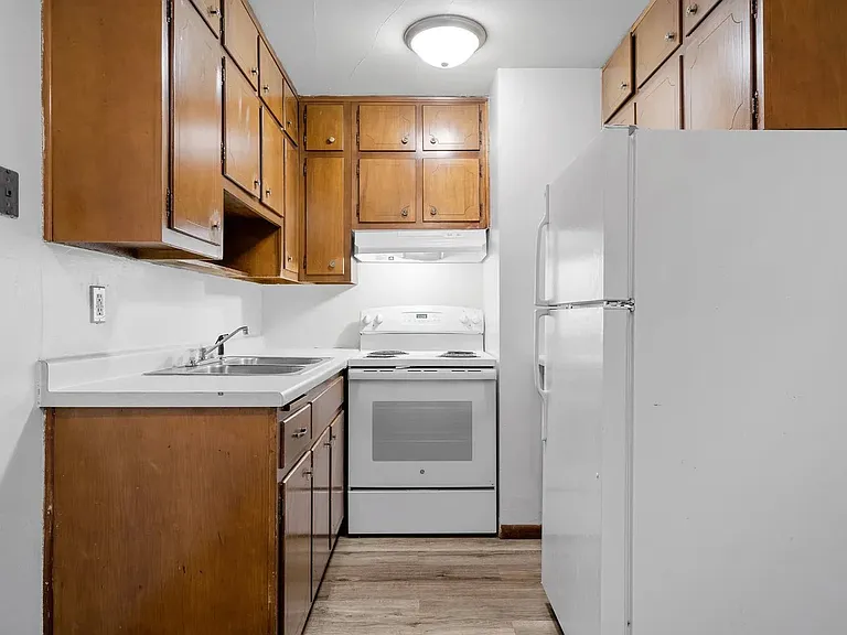 Step into modern living at Central Lakes of Uptown. This beautifully designed kitchen features sleek cabinetry, ample counter space, and modern appliances, perfect for culinary enthusiasts. Schedule your tour today to see your new home!