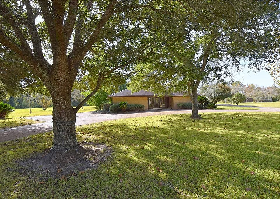 Beautiful mature trees provide ample shade throughout the acreage.