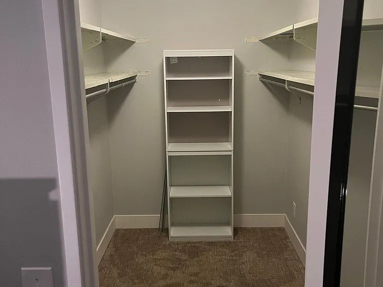 main bedroom walk in closet