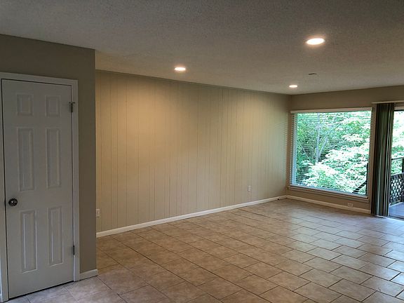 First Floor Living Area with dimmable ceiling lighting.