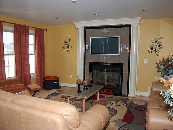 Living room with oversized gas fire place