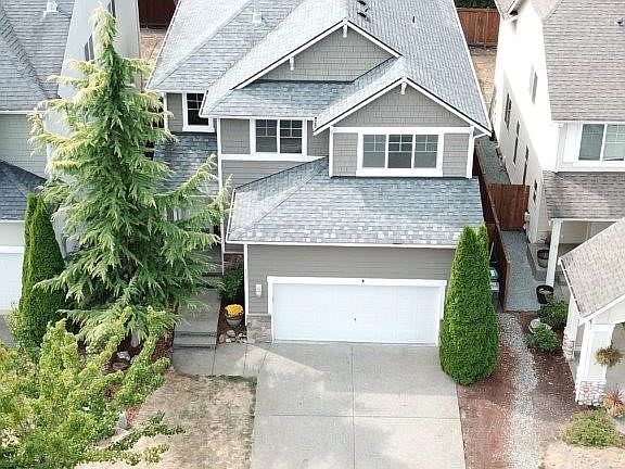 Notice the trees behind the home for extra privacy. 