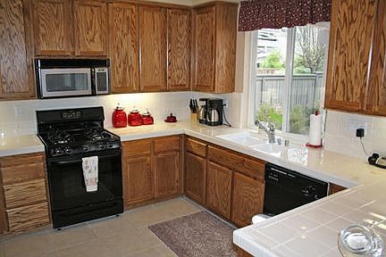 Spacious Kitchen with Oak Cabinet Upgrade