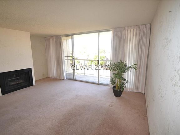 Gas fireplace in this spacious living room.