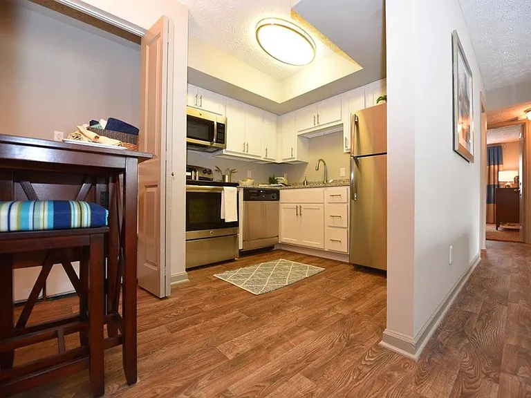 Kitchen with hardwood-style flooring