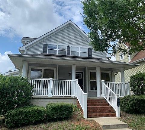 Modern Home with a large front porch for enjoying afternoon beverages...
