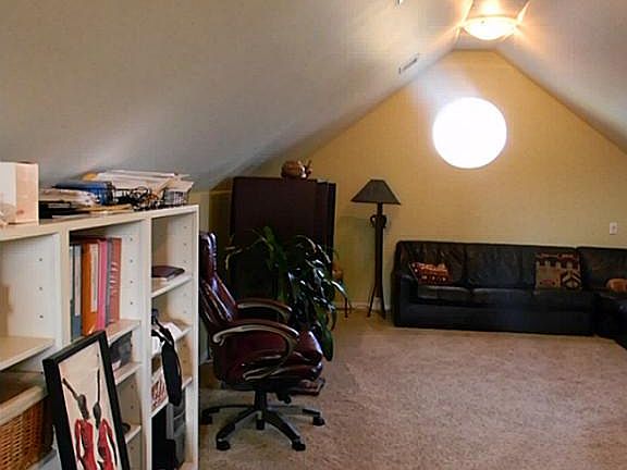 View of built-ins in large living area.