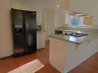 The Kitchen is open to the family room and conveniently located near the bonus