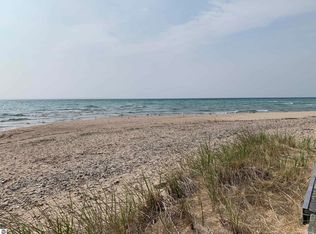 410 S Golden Beach Dr, Kewadin, MI 49648
